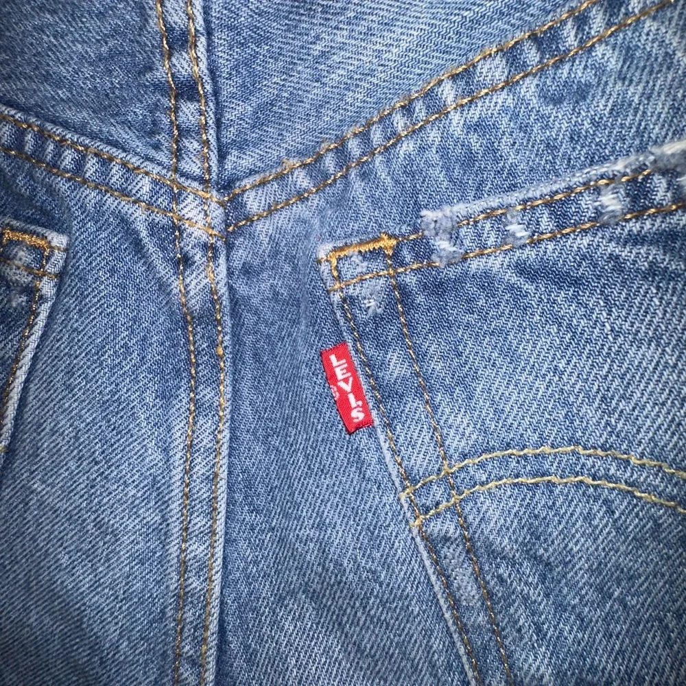 Levi's premium denim button fly Distressed Blue 501 Jean Shorts 25
